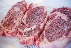 seasoned raw steaks
