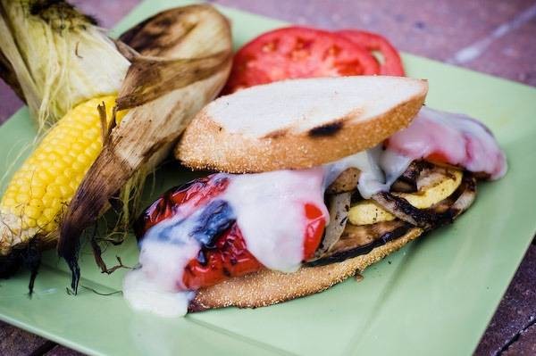 grilled veggie sandwich with corn on the cob