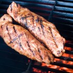 Dry rubbed pork tenderloin on the grill