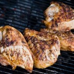 Dry rubbed chicken on the grill